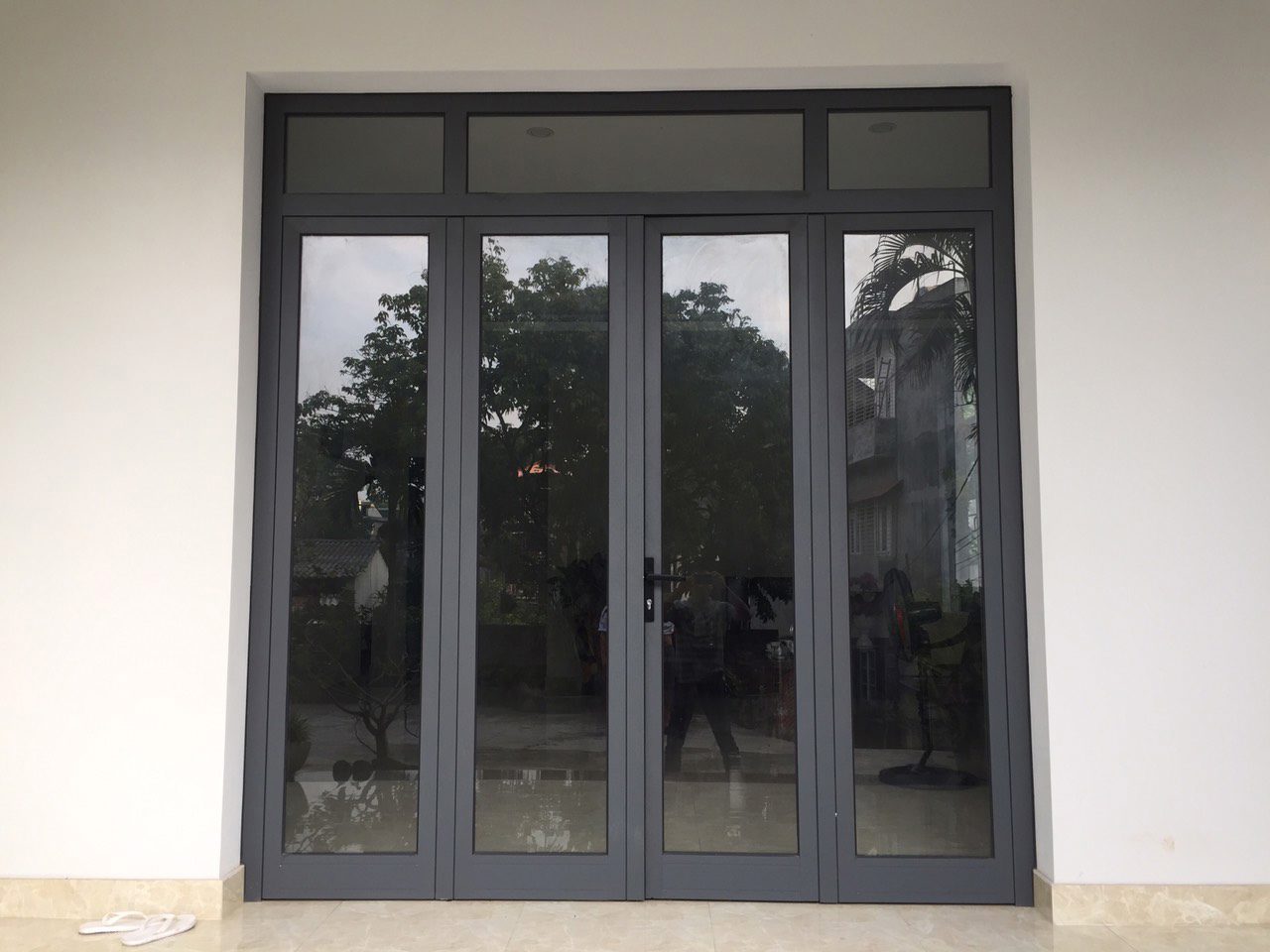 Cửa đi 4 cánh mở quay nhôm Xingfa cao cấp